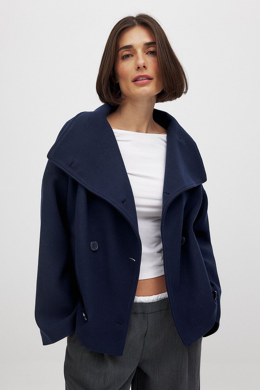 Krótki płaszcz wełniany dwurzędowy damski z szerokim kołnierzem oversize 6