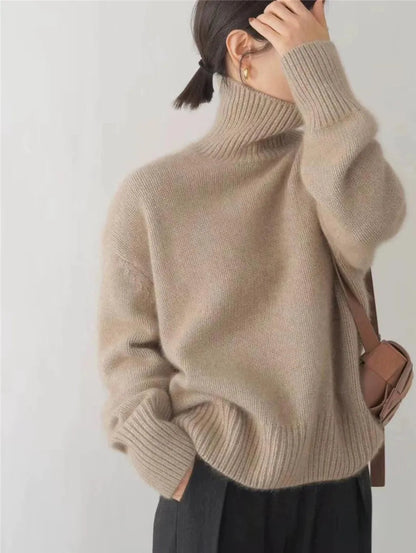 Sweter damski wełniany z golfem oversize 6